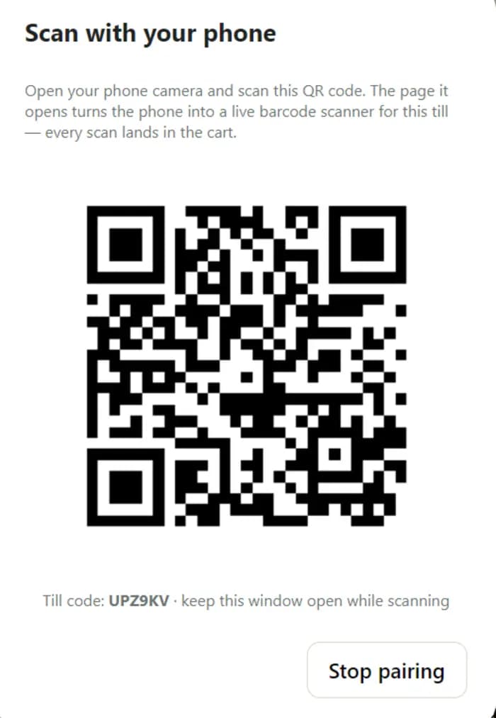 A dialog headed “Scan with your phone” showing a QR code, explaining that the page it opens turns the phone into a live barcode scanner for this till, with the till code UPZ9KV below it.